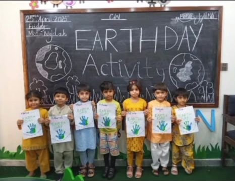 Class 1 students with their Earth Day artwork