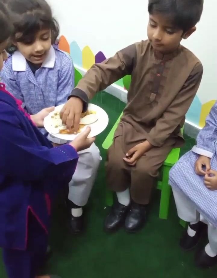 Young students practising sharing