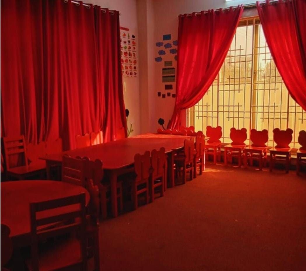 Early years classroom with child-sized chairs